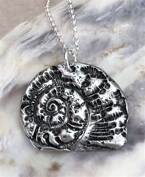 fossil silver necklace|fossil pendant.